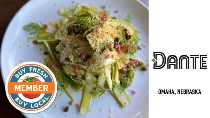 Dante Promo Photo featuring a gourmet plated entree of Shaved Nishnabotna Asparagus, Buratta, Pickled Ramps, Artichoke, Caper & Sicilian Olive Oil 