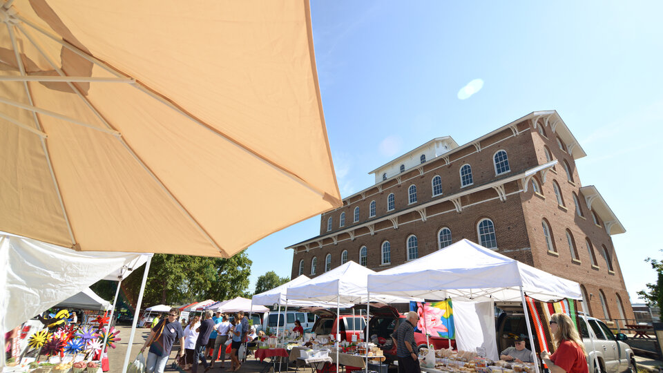 Photo of farmers market booths